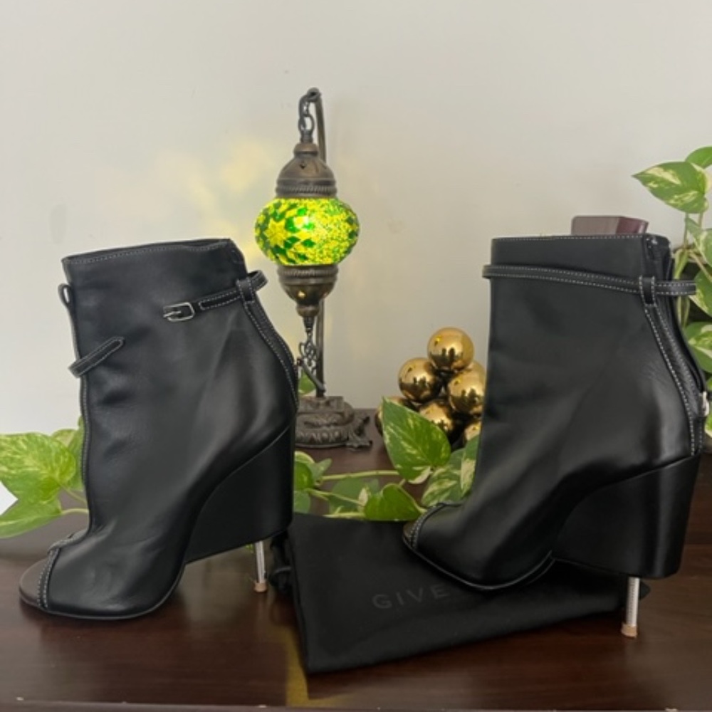 Sexy Givenchy Open Toe Booties with a silver tip heel. Hardly worn. Unique